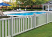 Vinyl fencing installed around a yard and a pool