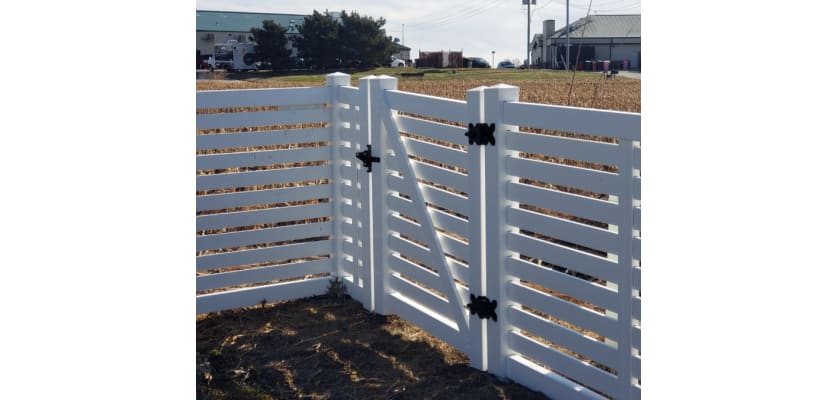 NewStead Vinyl Closed Picket Walk Gate in a fencing perimeter