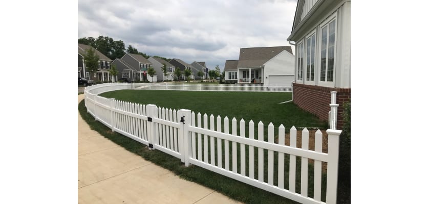 A Newstead Vinyl Picket Fence Walk Gate in a line of picket fencing