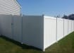 White vinyl fencing installed around a yard