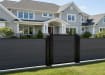 Gray Aluminum Walk Gate and fencing installed outside house