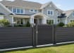 Gray gate installed in front of house 