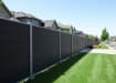 A row of Black NewStead Wood Plastic Composite Fencing 