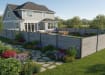 A perimeter of NewStead Light Grey Wood Plastic Composite Fencing around a family home 