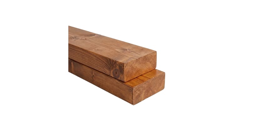 Western Red Cedar dimensional lumber beam – medium brown stained wood grain stacked timber close-up