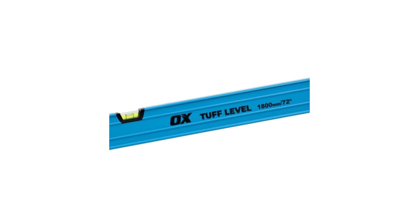 Close-up of an OX Tuff Level showing the 1800mm branding and spirit vial.