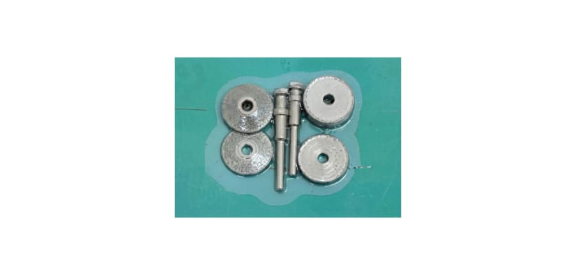A 6-piece nickel-bonded diamond grinding disc and wheel set with two rubber mandrels.