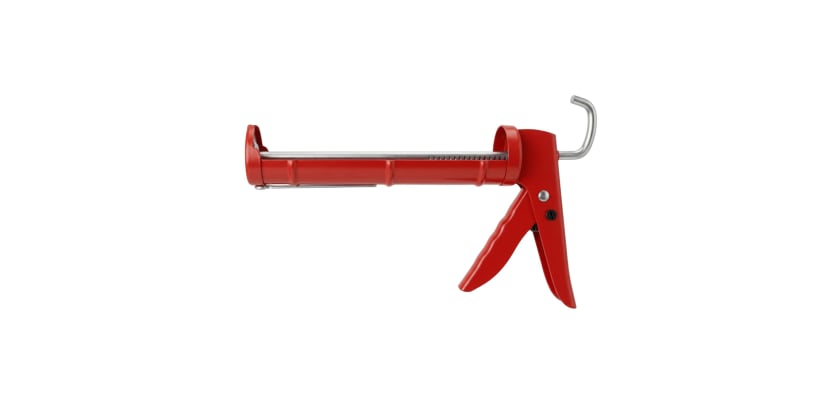 Red 9-inch manual caulking gun with a steel plunger and trigger on a white background